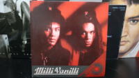 QI-32-Milli-Vanilli